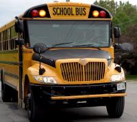 Picture of front of school bus with amber lights