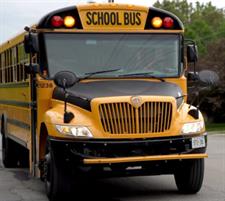 Picture of front of school bus with amber lights